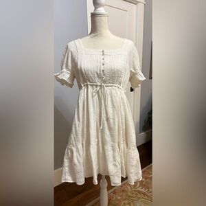 Madewell Puff-Sleeve Drawstring Mini Dress in white.